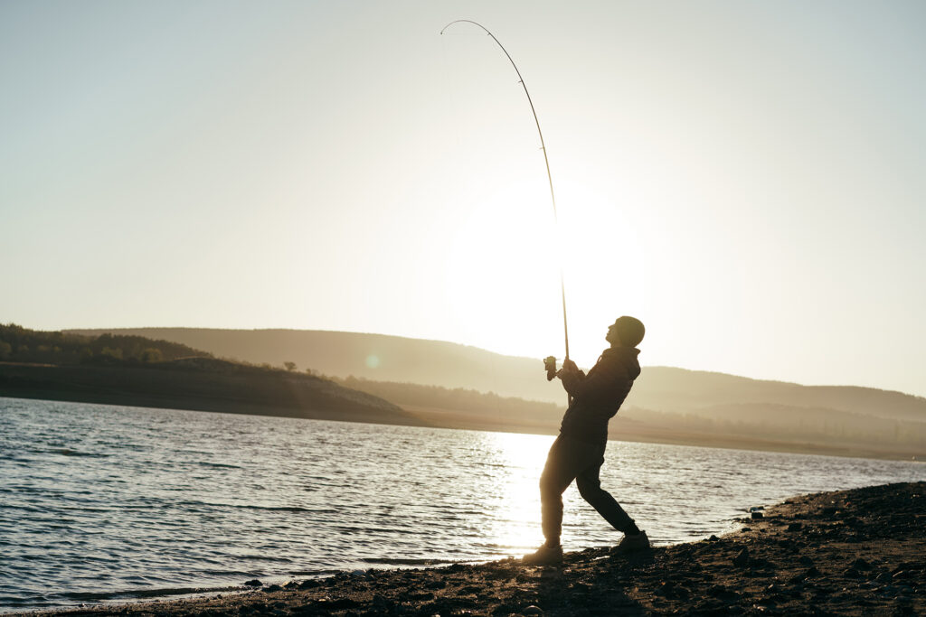 https://www.veals.co.uk/wp-content/uploads/2023/10/fisherman-with-rod-fishing-on-the-lake-2021-09-02-09-25-37-utc-1024x683.jpg